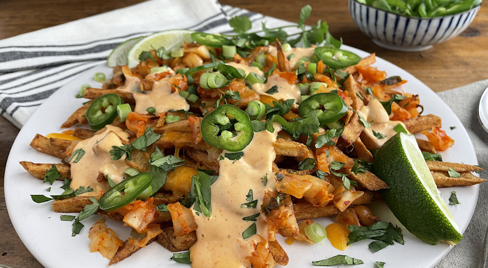 Close up of loaded kimchi fries