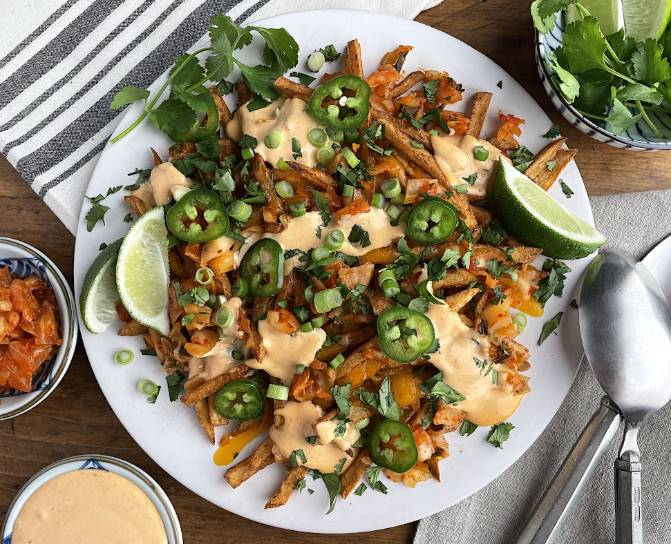 Kimchi fries with spicy mayo, cheese, cilantro and jalapenos
