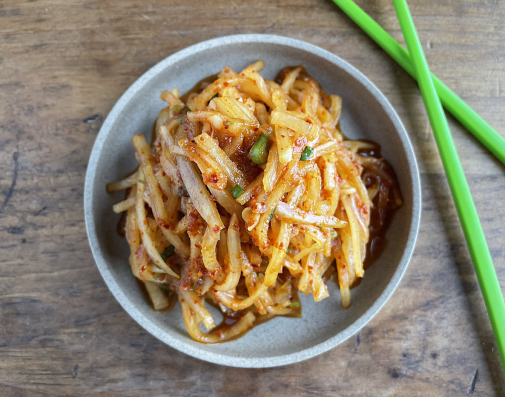 Moochae, an easy kimchi alternative, with green chopsticks