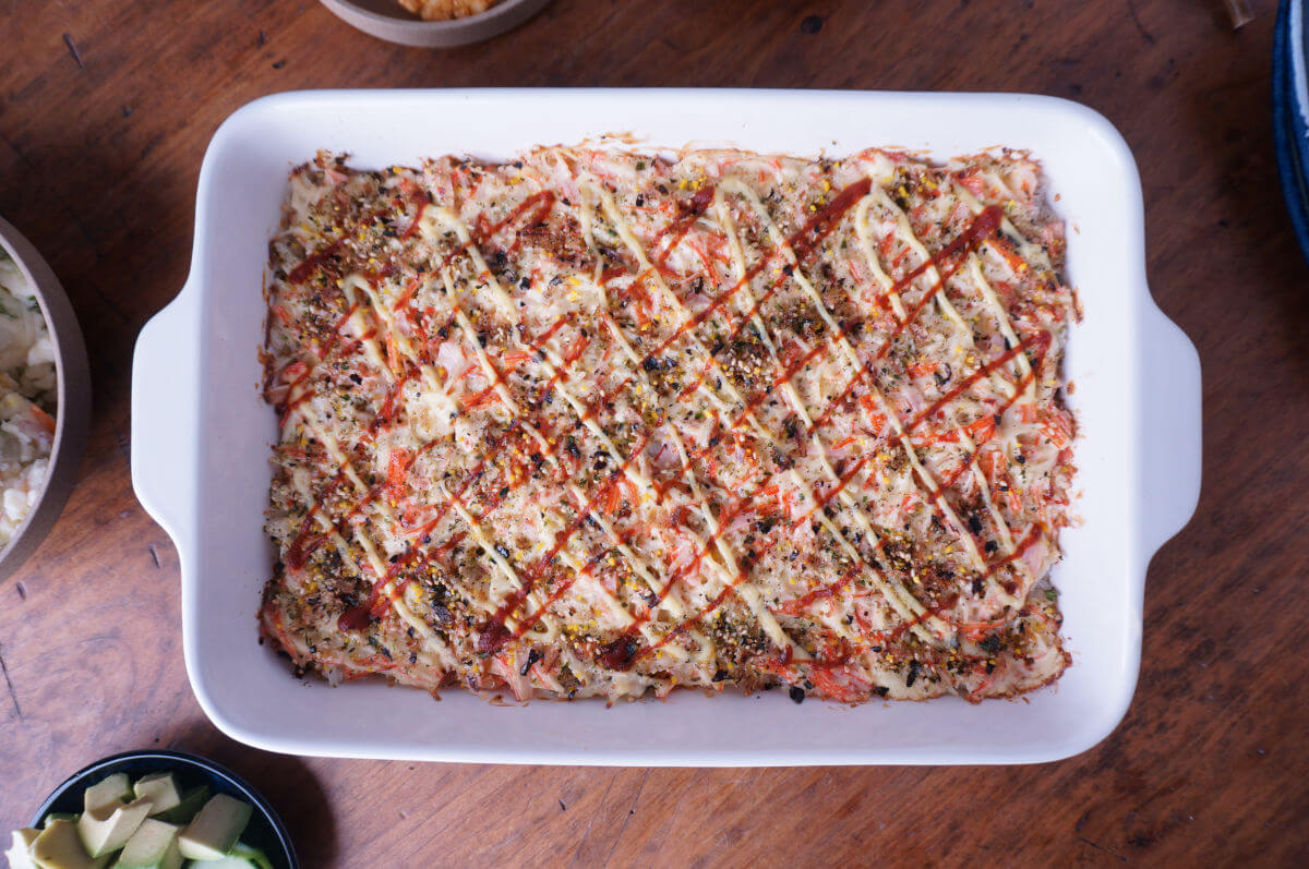 sushi bake in a casserole dish on a table