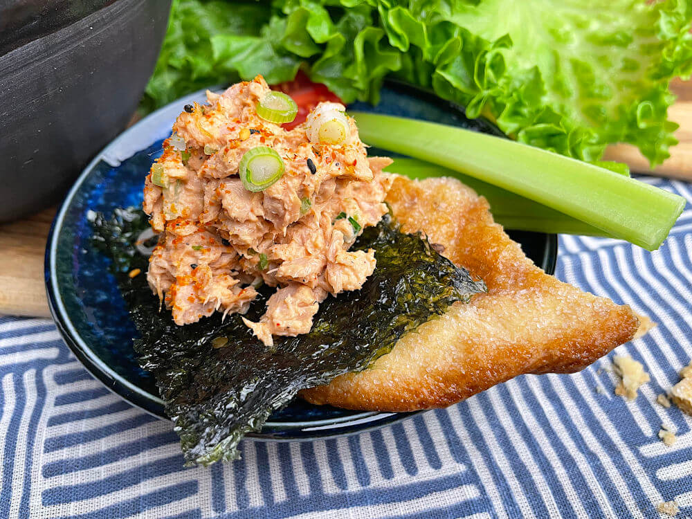 Gochujang tuna salad on a piece of flatbread and nori