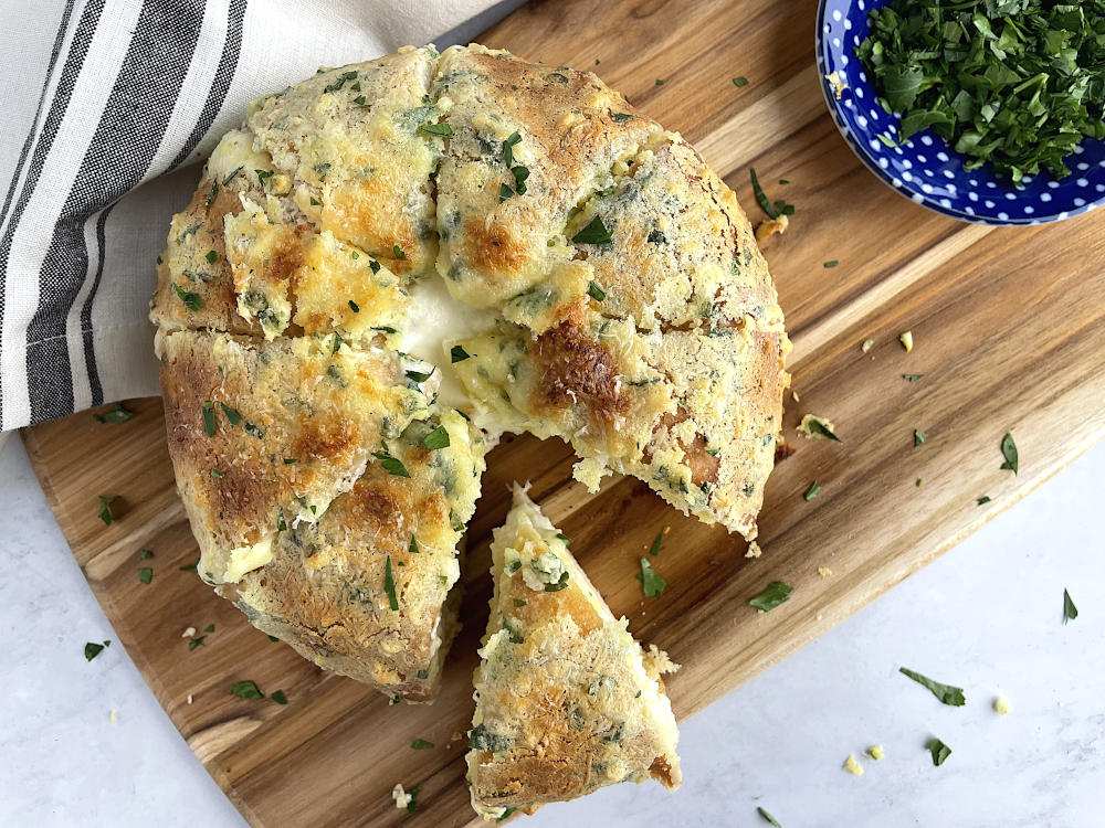 Korean Cream Cheese Garlic Bread with a piece cut out