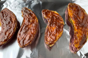 Sweet potatoes with miso butter sauce before broiling