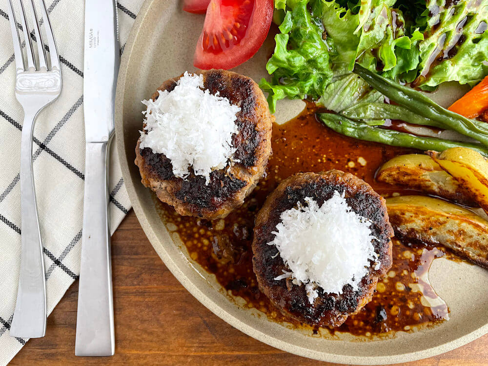 Wafu hambagu with a fork and knife